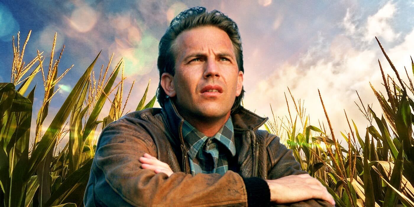 Kevin Costner sitting in a field with light shining around him.