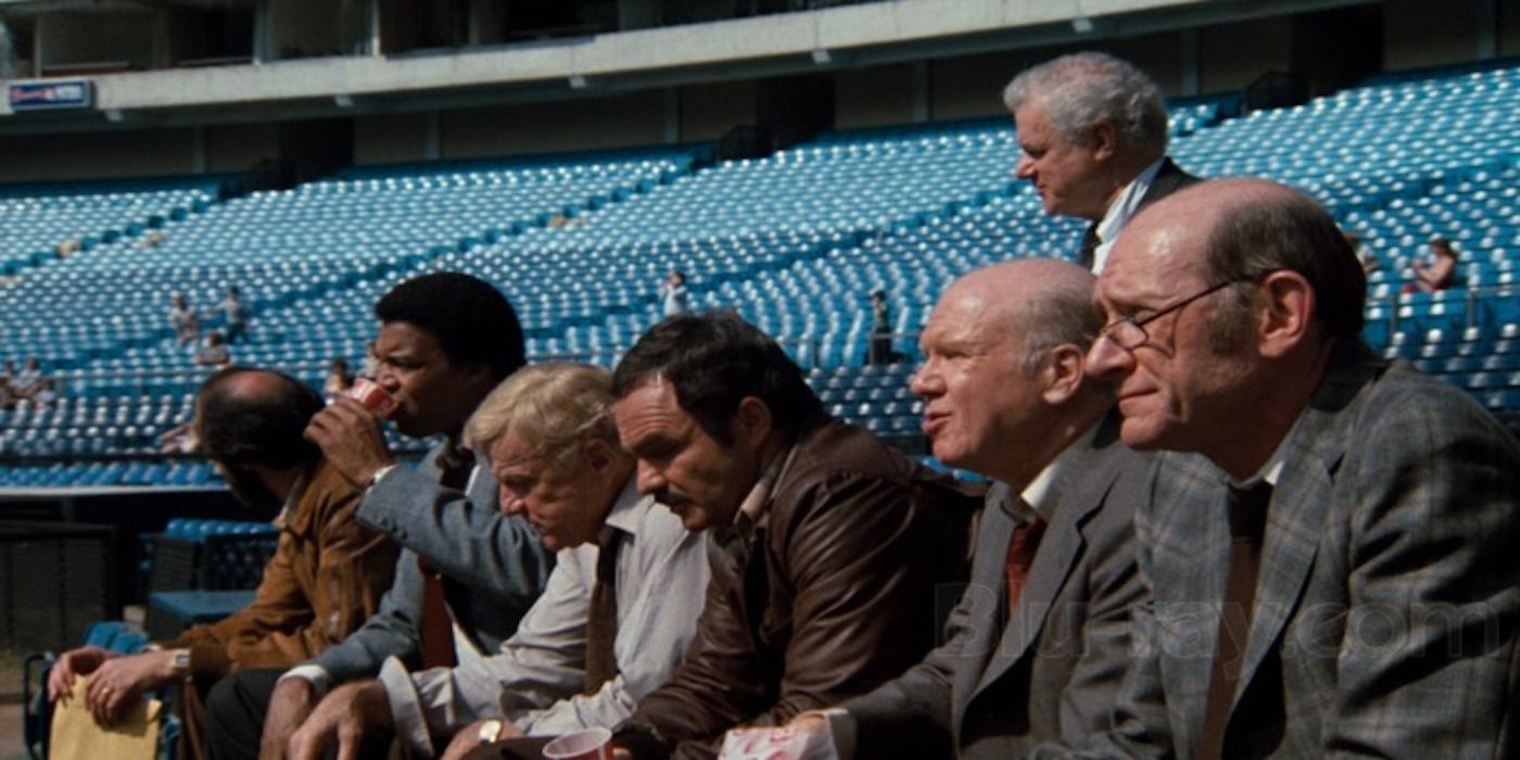 Burt Reynolds and his colleagues at a ballpark in Sharky's Machine
