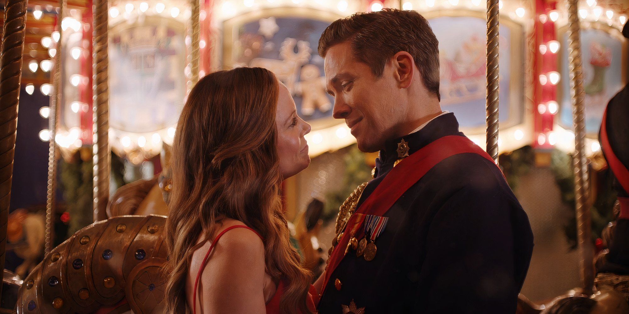 Rachel Boston as Lila looks at Neal Bledsoe as Whitaker in A Christmas Carousel.