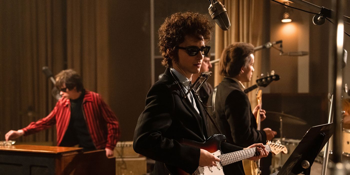 Timothee Chalamet wearing sunglasses in a recording studio as Bob Dylan in A Complete Unknown.