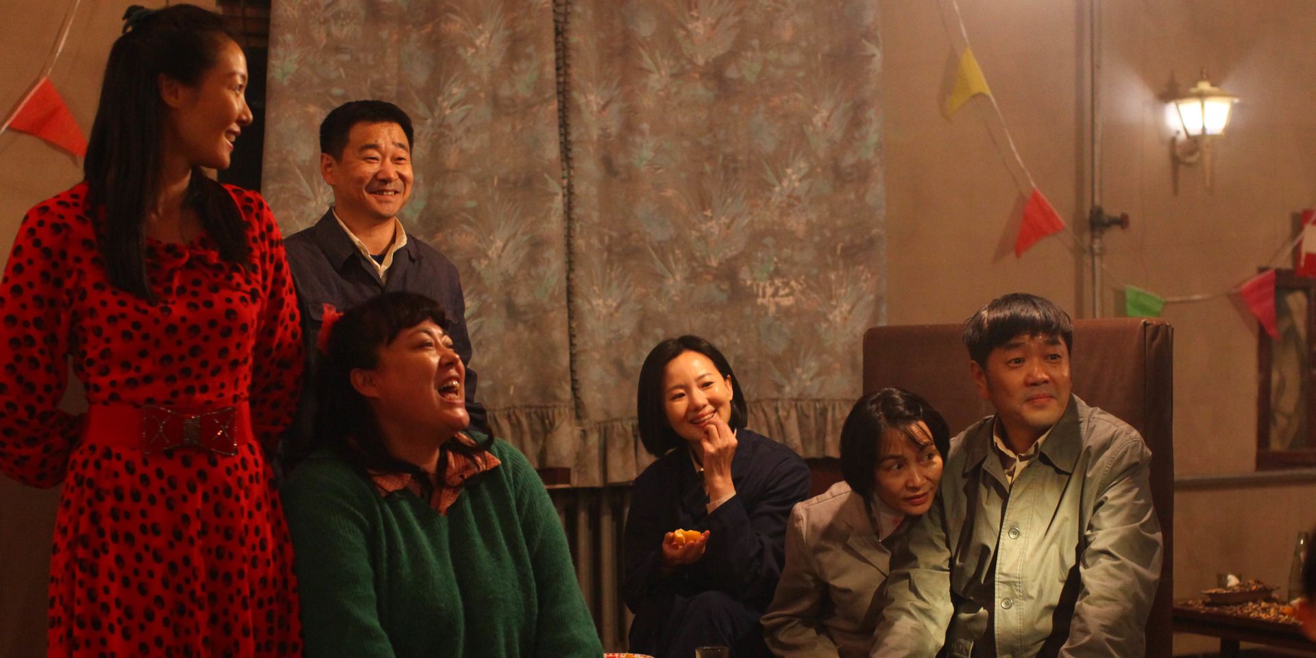 A happy family at home in &lsquo;So Long, My Son&rsquo;