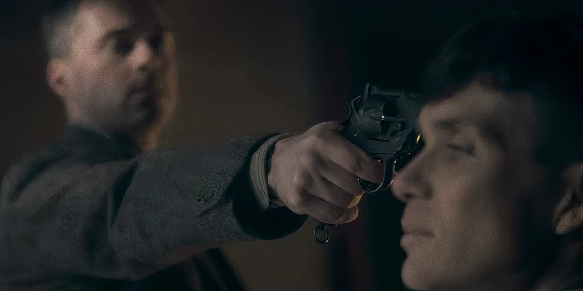 A man points a gun at Cillian Murphy&rsquo;s head in Peaky Blinders