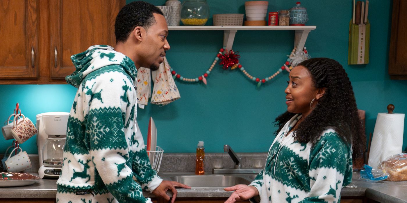 Quinta Brunson and Tyler James Williams talking while wearing matching Christmas pajamas