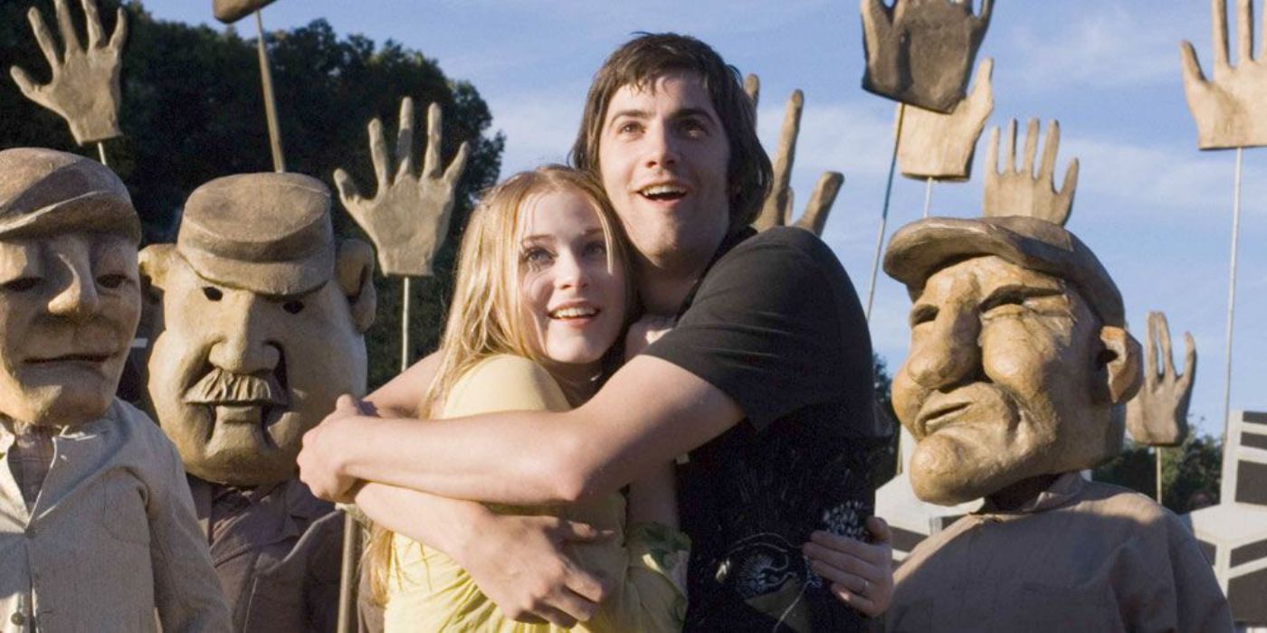 Jude and Lucy hugging in Across the Universe