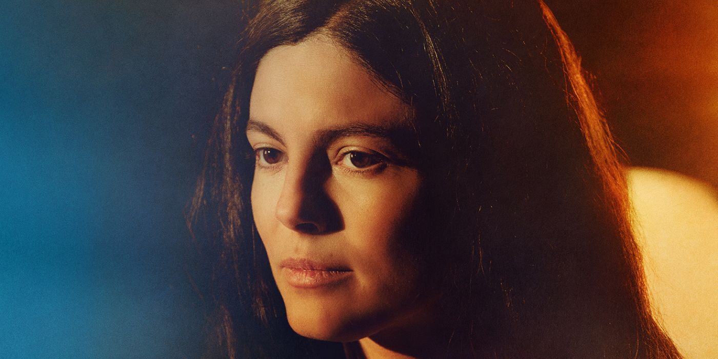 Monica Barbaro as Joan Baez on a character poster for A Complete Unknown.