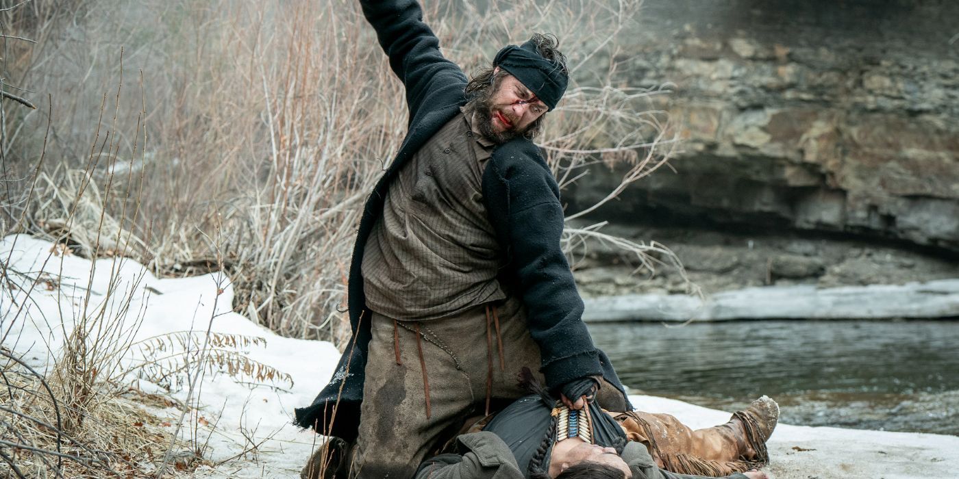 Joe Tippett holds a weapon above his head and prepares to kill a man in 'American Primeval'