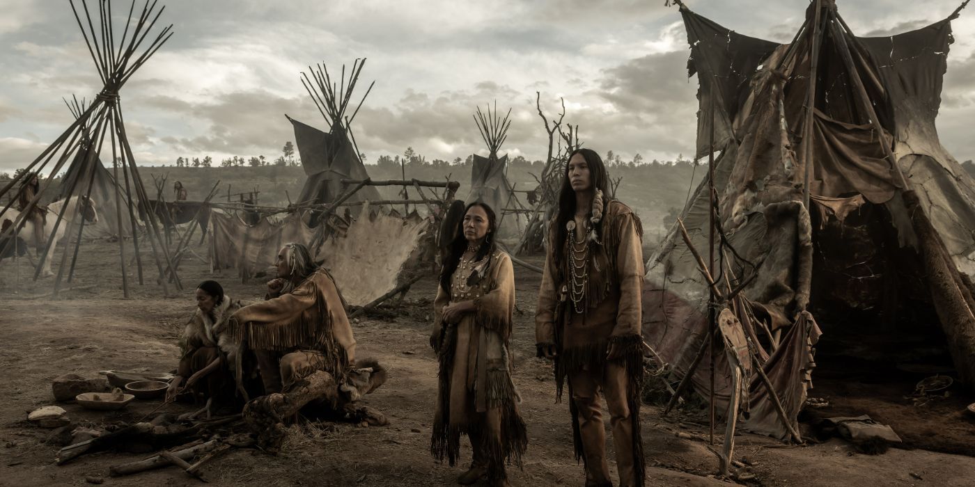 Derek Hinkey and a woman stand outside of a Tipi looking incredibly disheartened in &lsquo;American Primeval&rsquo;