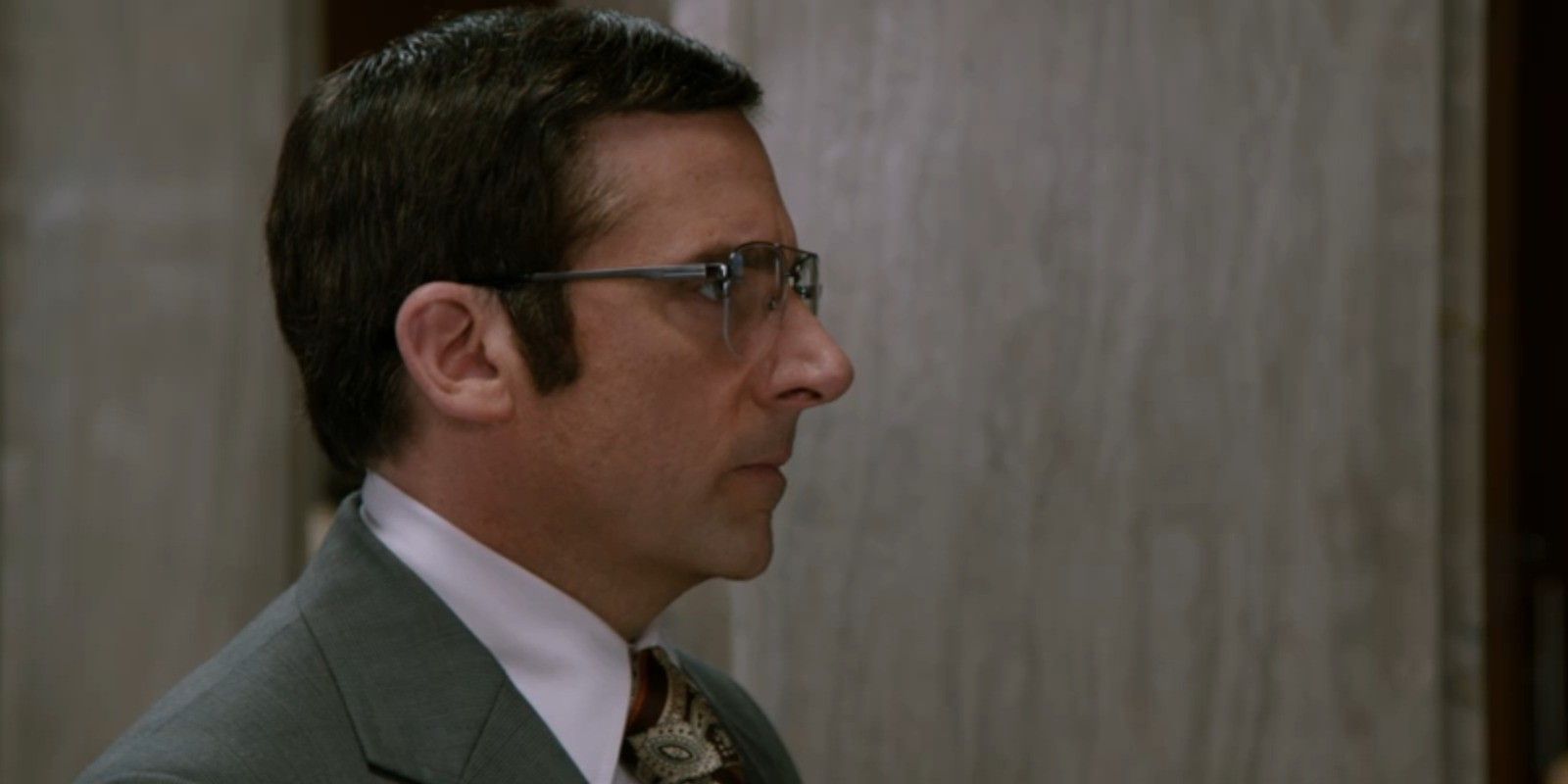 Steve Carell as Brick Tamland facing off to the right as he proclaims that he can always guess how many jelly beans are in a jelly bean jar, even if he's wrong, in Anchorman 2: The Legend Continues