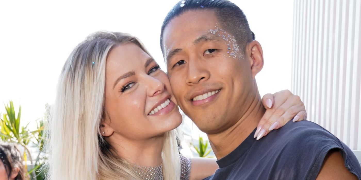 Ariana Madix and Daniel Wai posing on a balcony together for Vanderpump Rules.