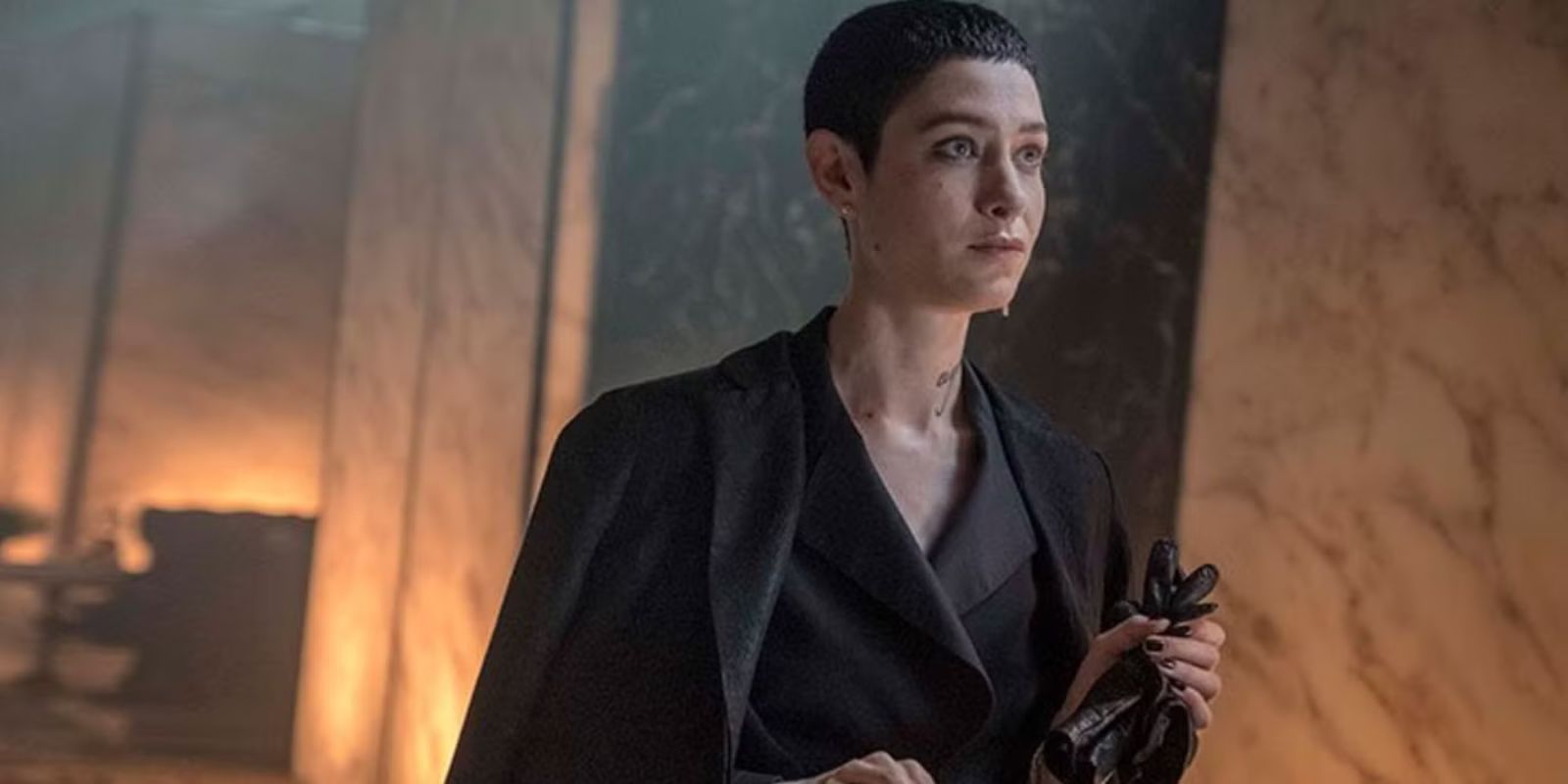 The Adhudicator looking intently ahead in John Wick Chapter 3 - Parabellum