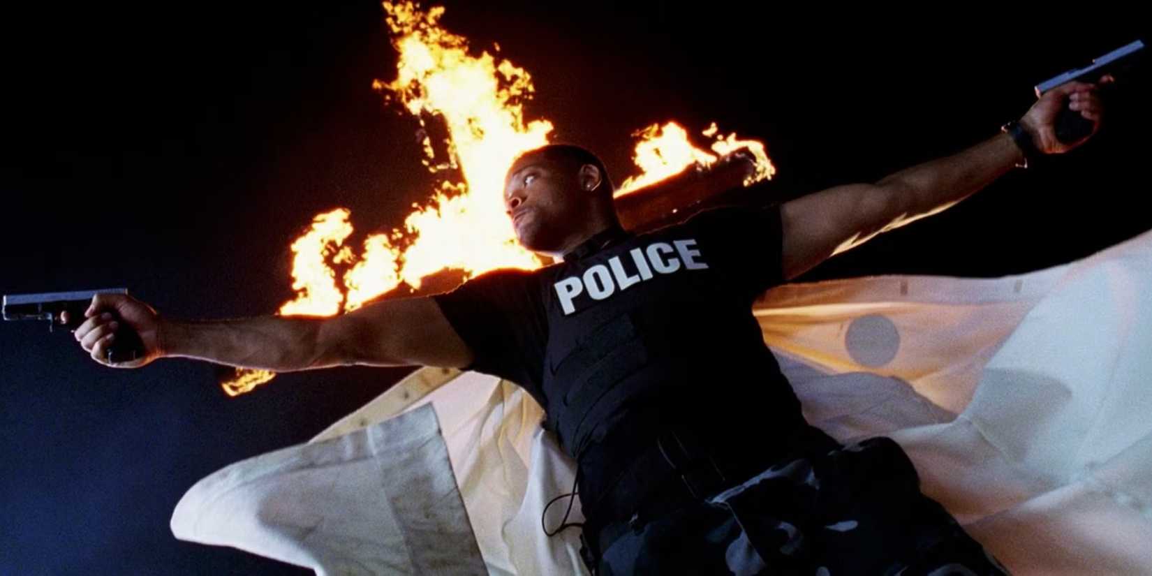 Will Smith aiming a gun in each hand in Bad Boys II