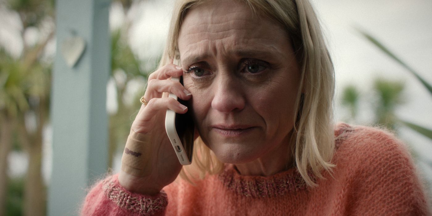 Anne-Marie Duff looking tearful on a phone call