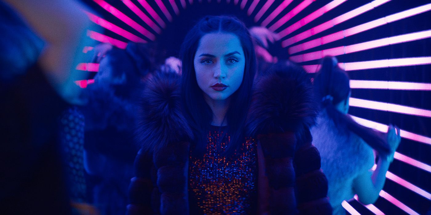 Eve Macarro (Ana de Armas) in a neon-lit club in Ballerina 