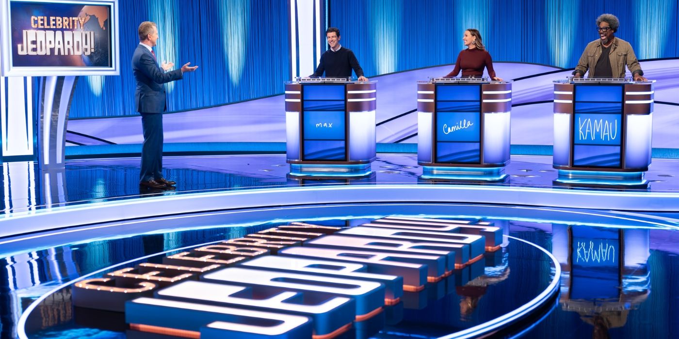 A wideshot of the &lsquo;Celebrity Jeopardy&rsquo; set featuring host Ken Jennings, Max Greenfield, Camilla Luddington, and W. Kamau Bell.