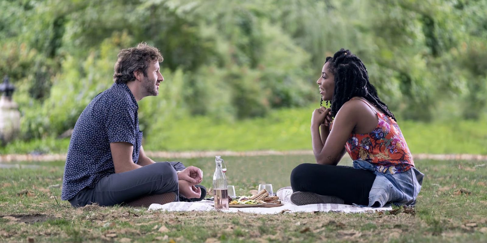 Chris O&rsquo;Dowd and Jessica Willaims talking in the park in The Incredible Jessica James