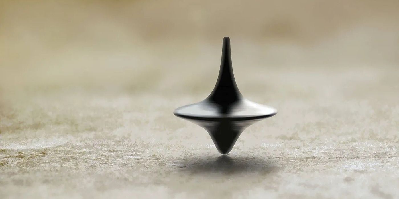 Cobb&rsquo;s totem, a tiny top, standing on end at the conclusion of Inception.