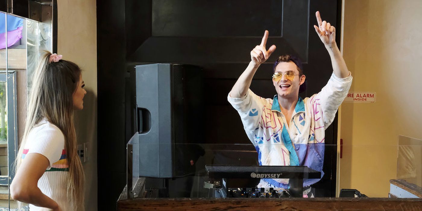 James Kennedy performs a DJ set with his girlfriend Raquel Levis by his side.