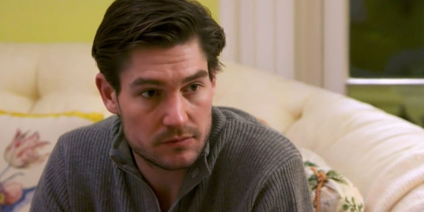 Craig Conover at Patricia Altschul&rsquo;s house sitting on a couch on Southern Charm.