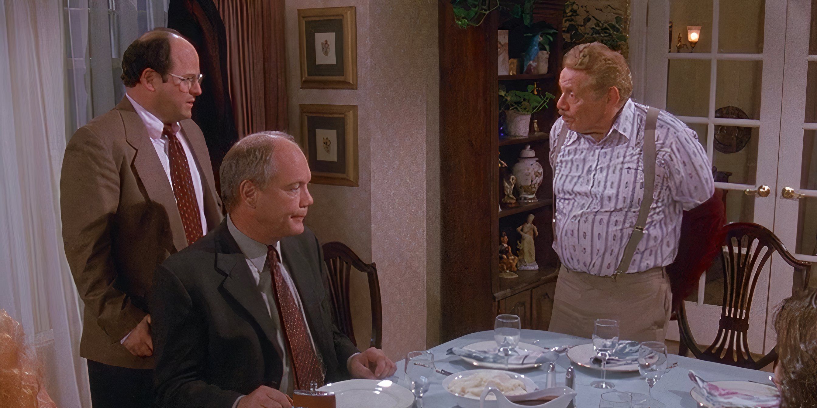 George (Jason Alexander), Kruger (Daniel von Bargen), and Frank (Jerry Stiller) at the dinner table in &lsquo;Seinfeld&rsquo;