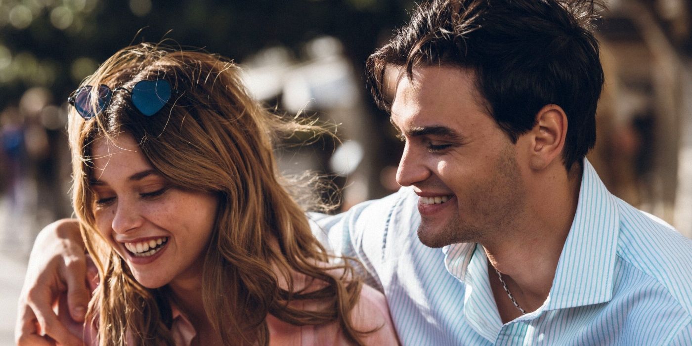 Nicole Wallace as Noah laughing with Gabriel Guevara as Nick, who has his arm around her, in Culpa Tuya