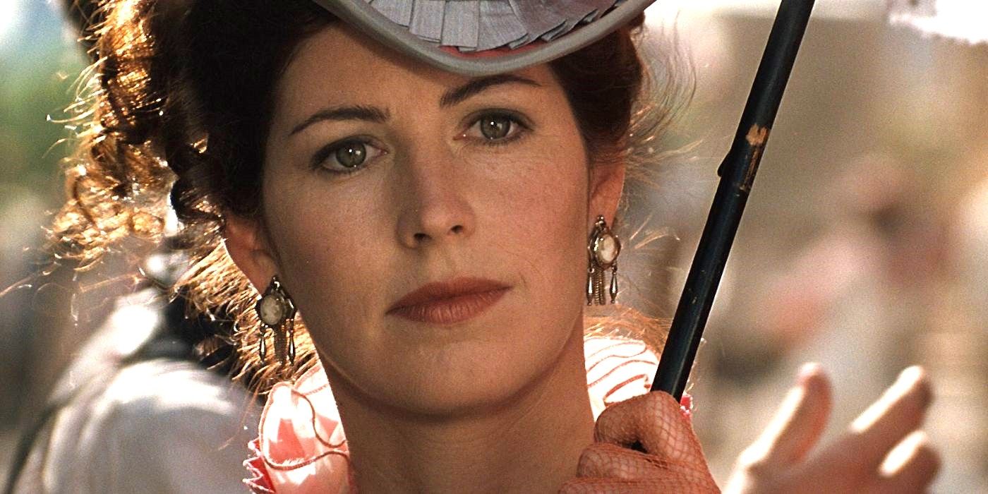 Dana Delany as Josephine Marcus holds a frill umbrella and wears lace gloves in Tombstone.