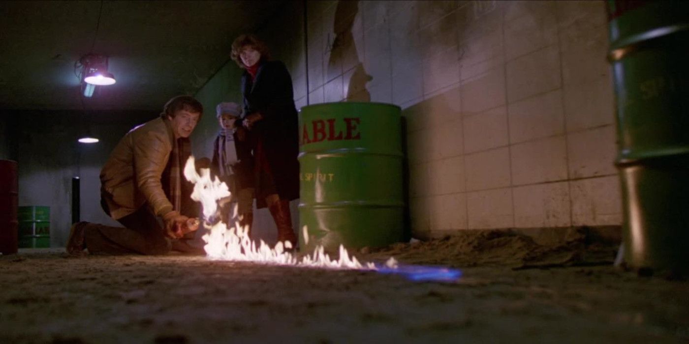 People start a fire to kill mutant rats in Deadly Eyes.
