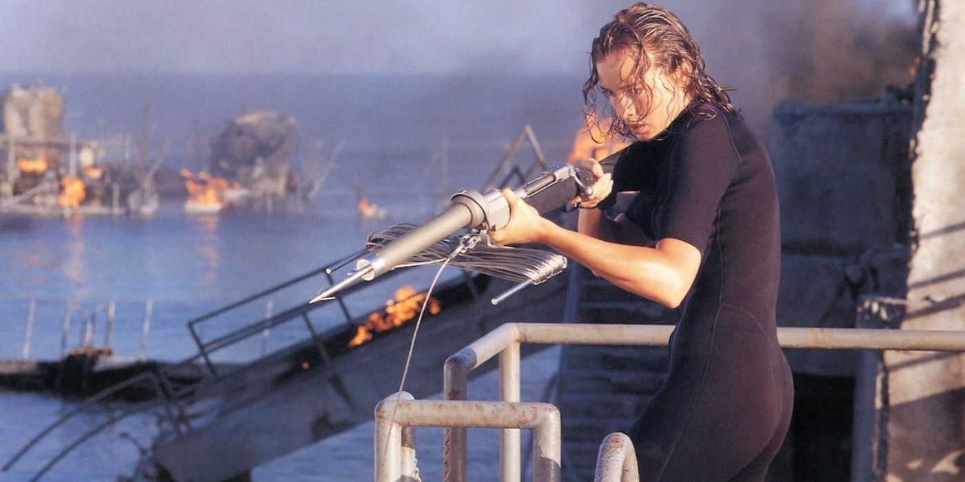 Susan McAlester aiming a rifle in Deep Blue Sea