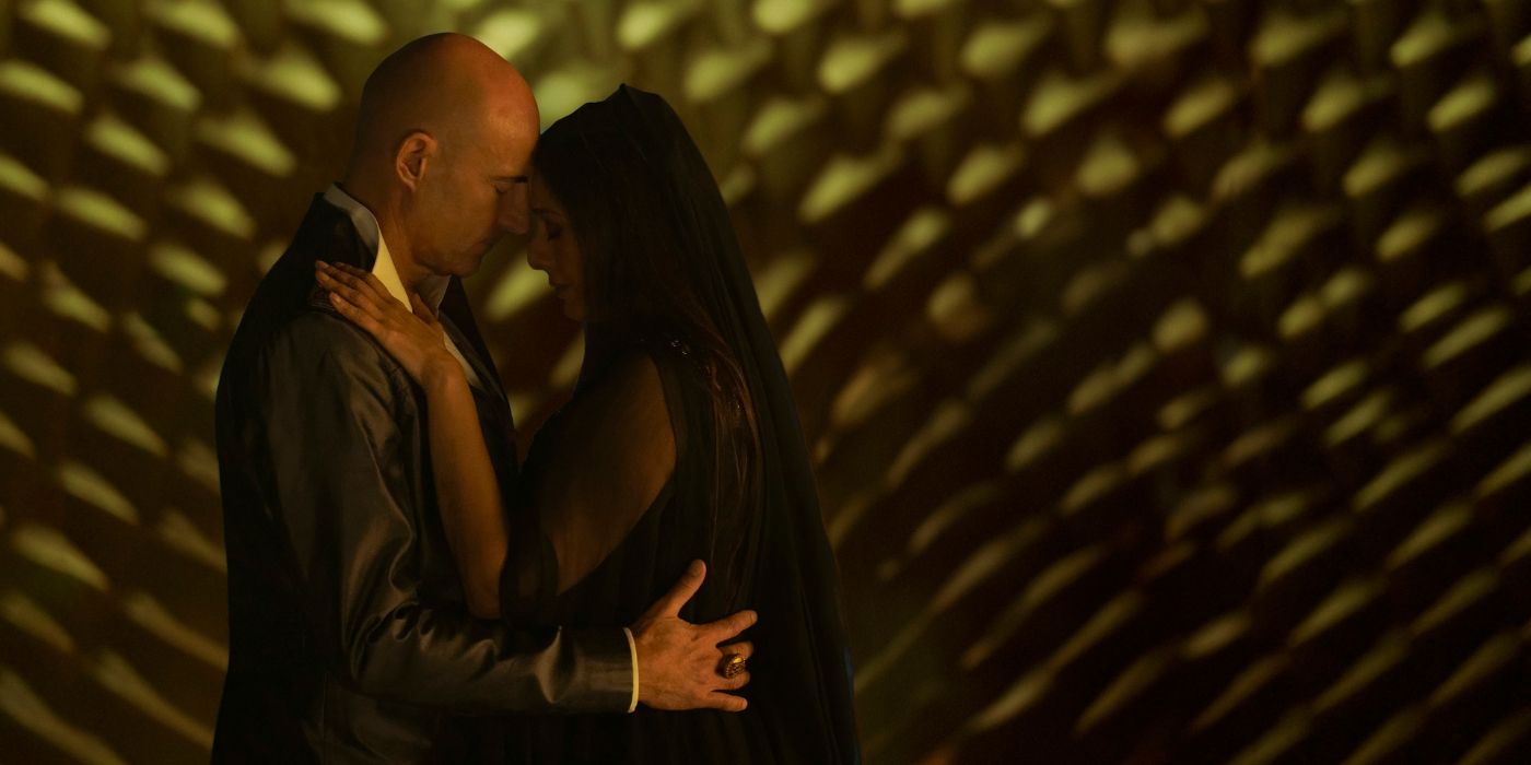 Mark Strong and Tabu embracing in Dune: Prophecy