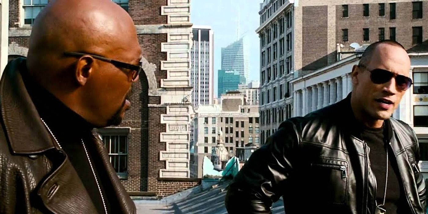 Dwayne Johnson and Samuel L. Jackson on a rooftop in 'The Other Guys'