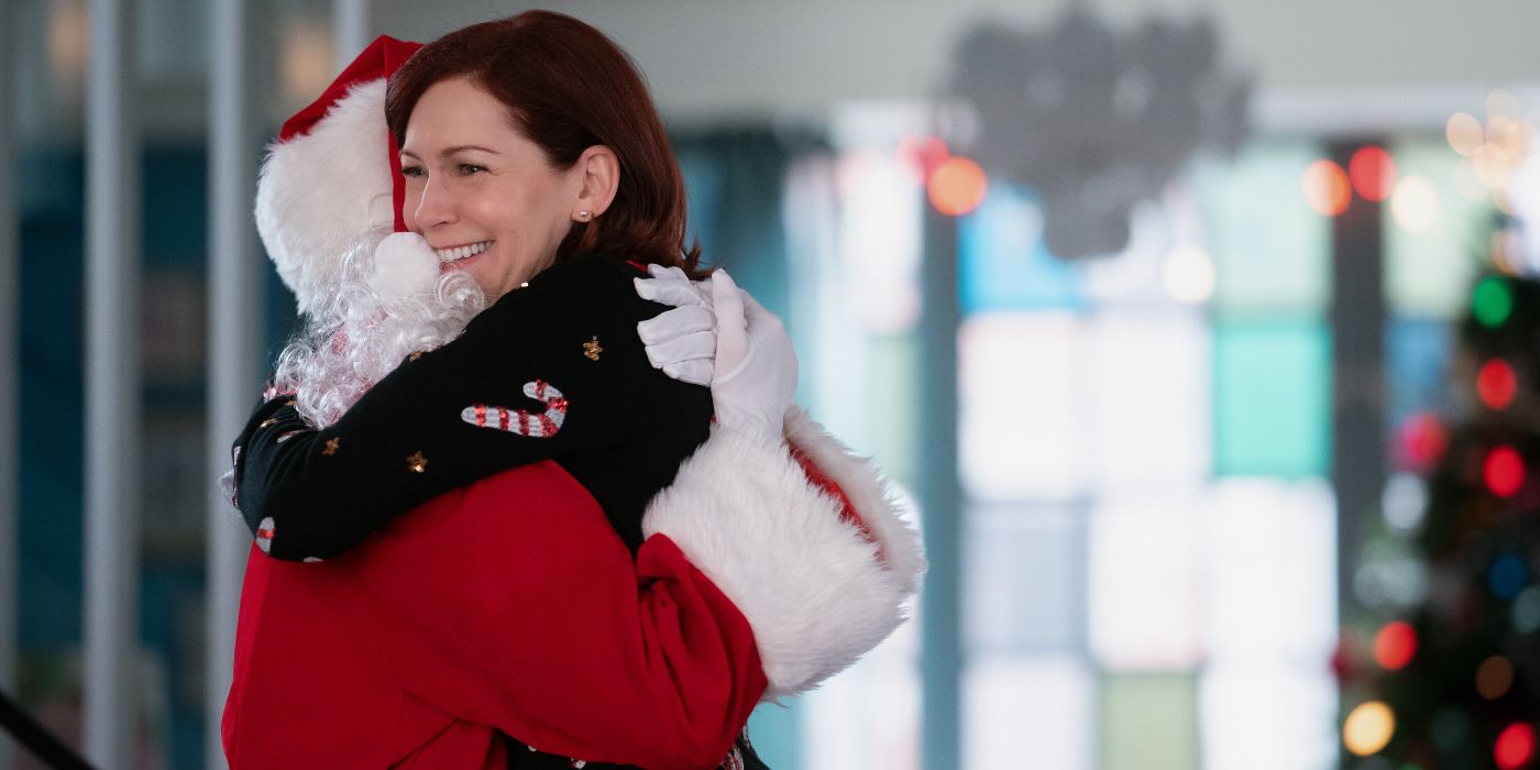 Carrie Preston hugging someone dressed as Santa in Elsbeth Season 2 Episode 6