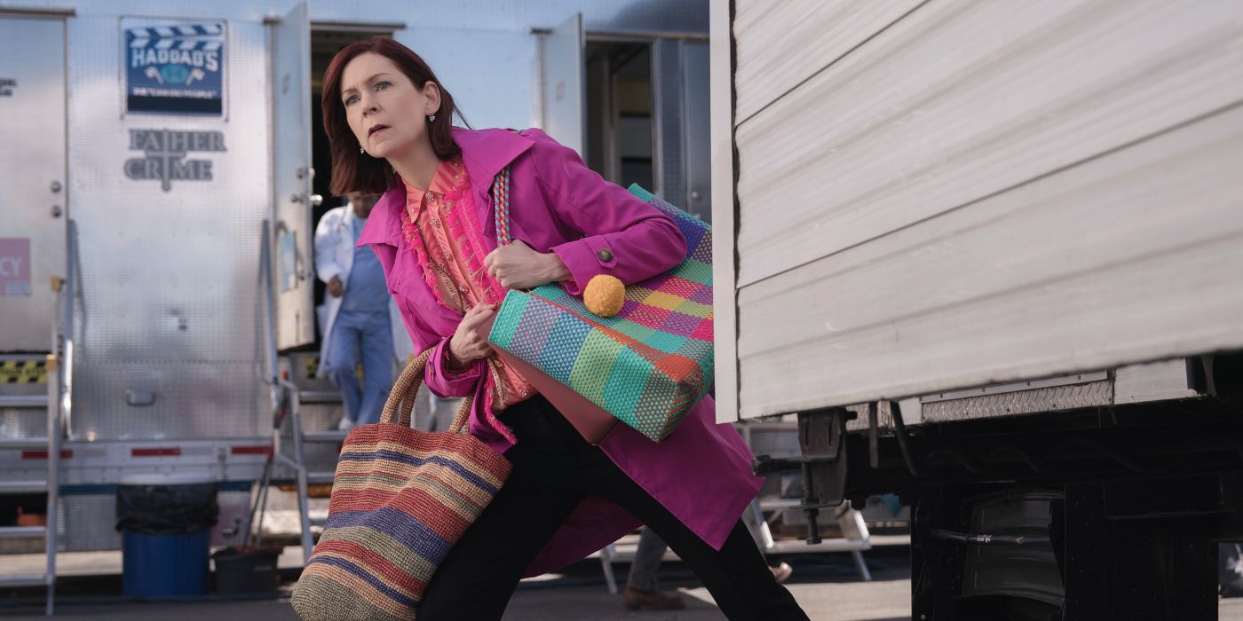 Carrie Preston peering around a trailer