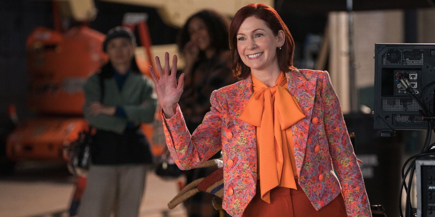 Carrie Preston waving on a film set