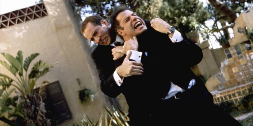 Nic Cage and John Travolta fighting in Face/Off.
