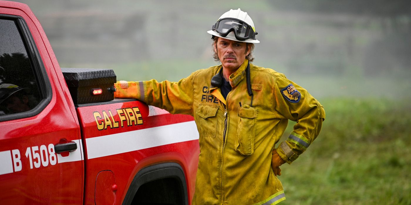 Billy Burke standing next to a Cal Fire truck