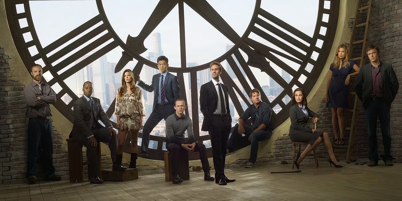 The cast of FlashForward standing in front of a large clock dial