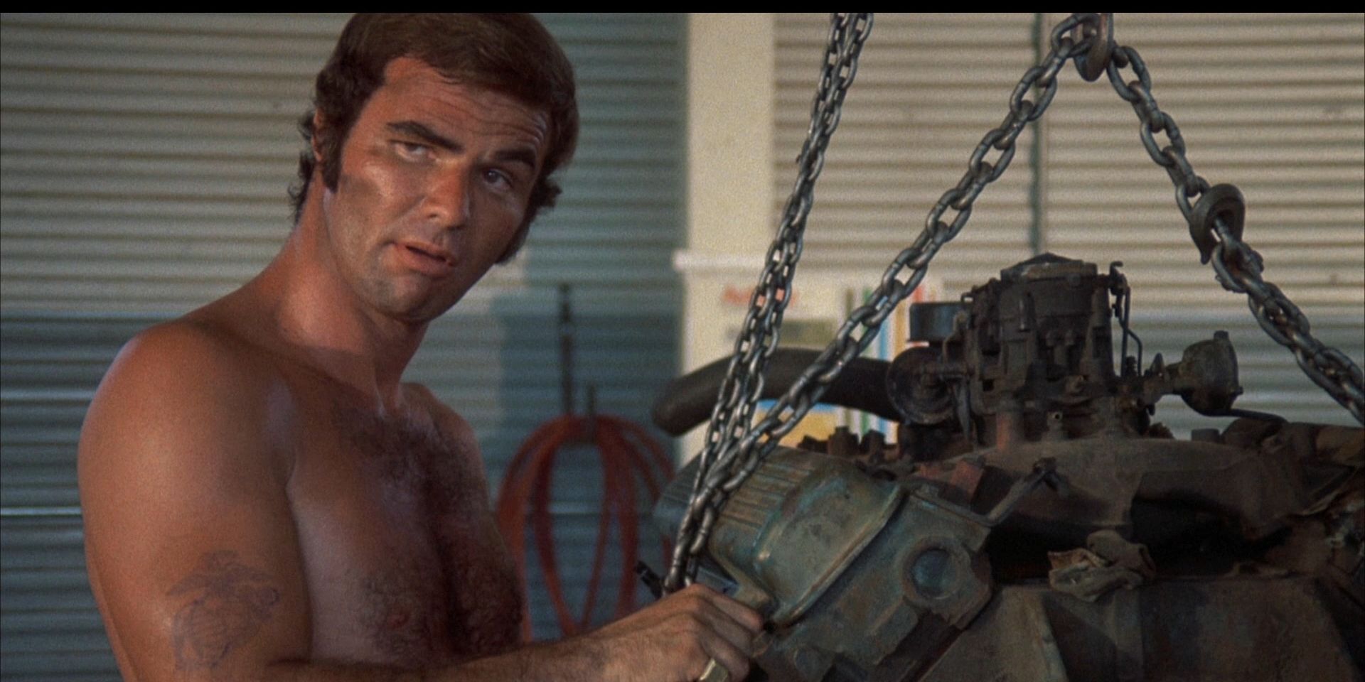 Gator (Burt Reynolds) fixing an engine in &lsquo;White Lightning&rsquo;.