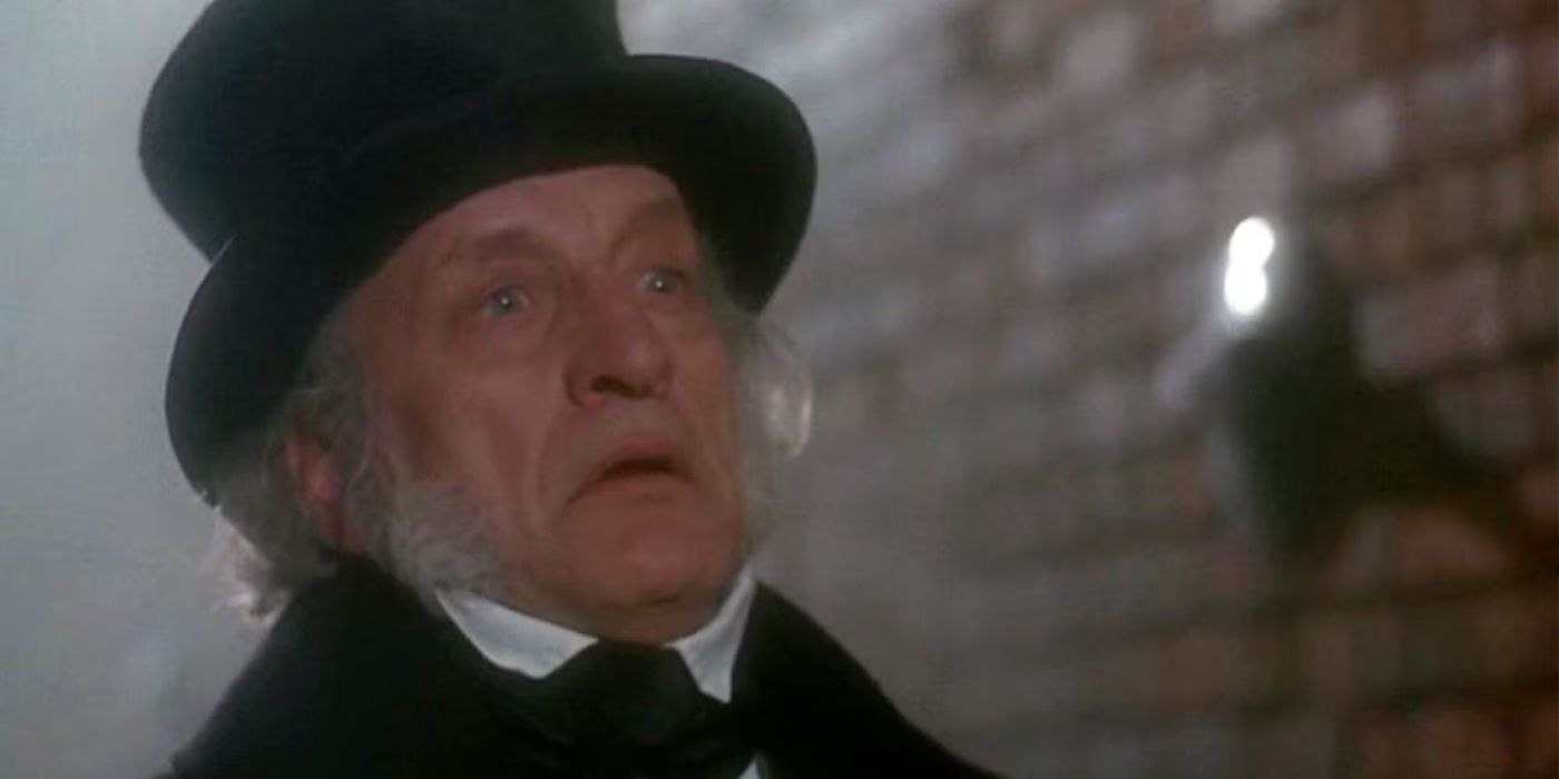 George C. Scott as Ebenezer Scrooge looking shocked in A Christmas Carol (1984).