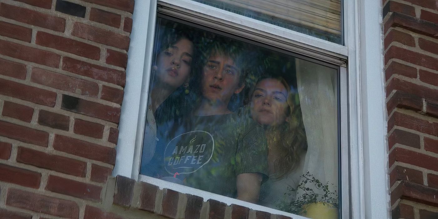 Devin (Sam McCarthy), Cece (Jayden Bartels), and Frankie (Galilea La Salvia) stare down at something offscreen from a window in Goosebumps: The Vanishing