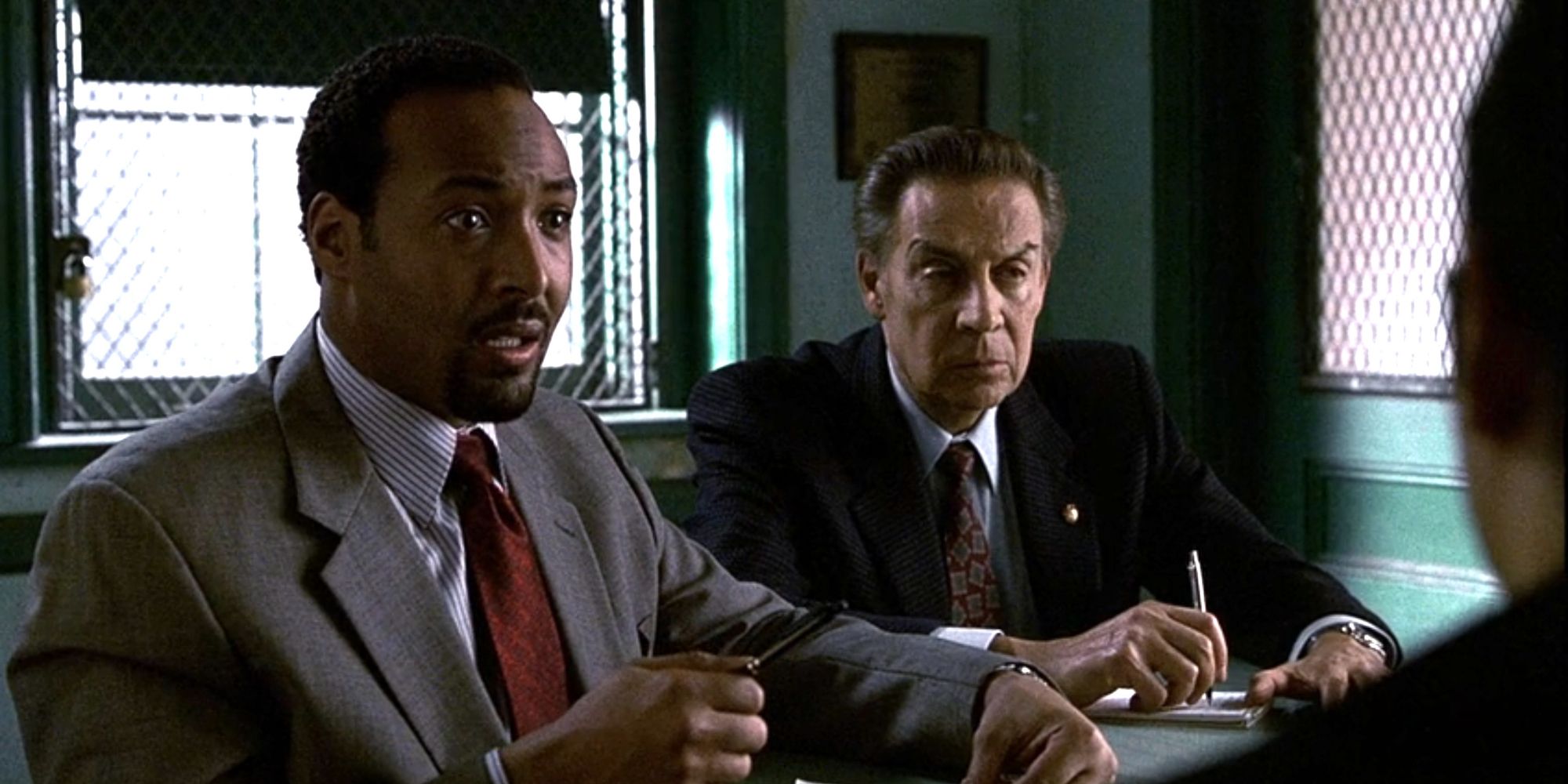 Green (Jesse L. Martin) and Briscoe (Jerry Orbach) investigating in 'Law & Order' season 10, episode 21 "Narcosis."