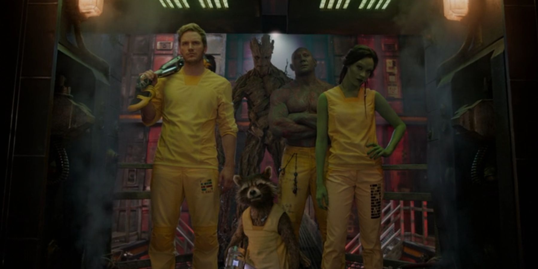 Star-Lord, Rocket, Groot, Drax and Gamora look serious while standing in a doorway in 'Guardians of the Galaxy'.