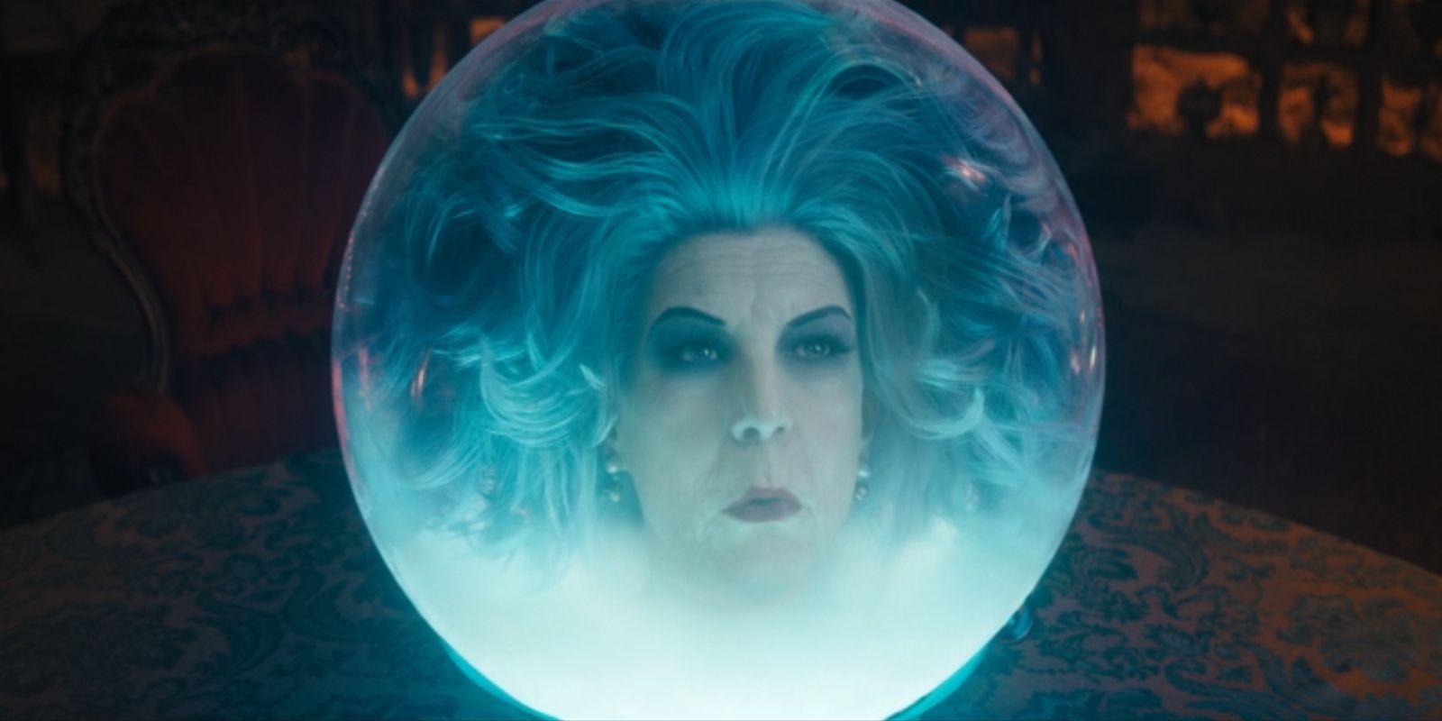 Madame Leota, played by Jamie Lee Curtis, speaks from inside her crystal ball in 'Haunted Mansion'.