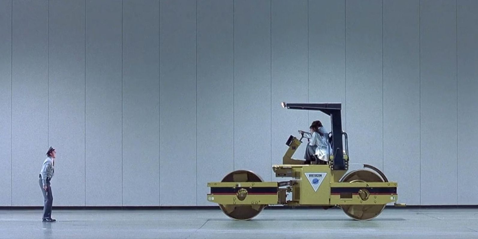 Henchman in front of a steamroller in 'Austin Powers International Man of Mystery'