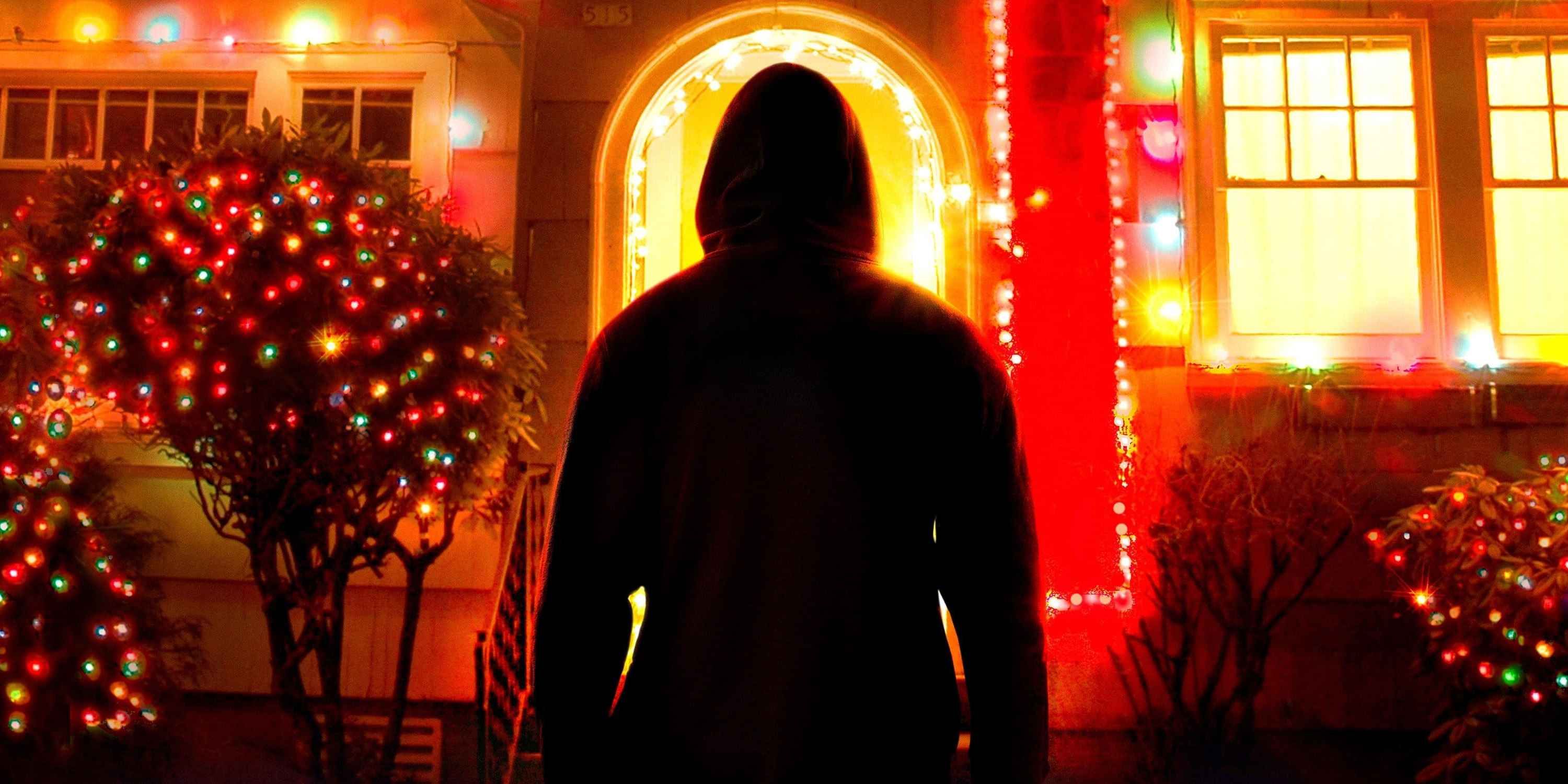 A hooded silhouette stands at a house decorated for Christmas in artwork for?Homicide for the Holidays