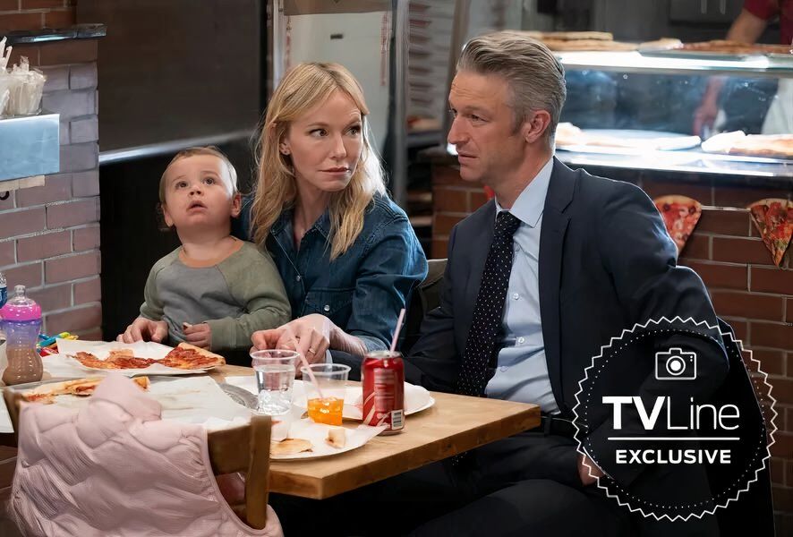 Carisi is sharing a meal with his family in a restaurant