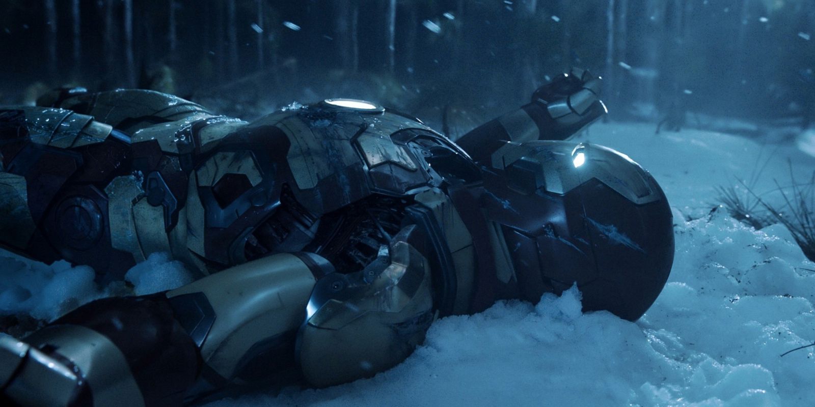 Tony Stark/Iron Man lays in the snow in Iron Man 3