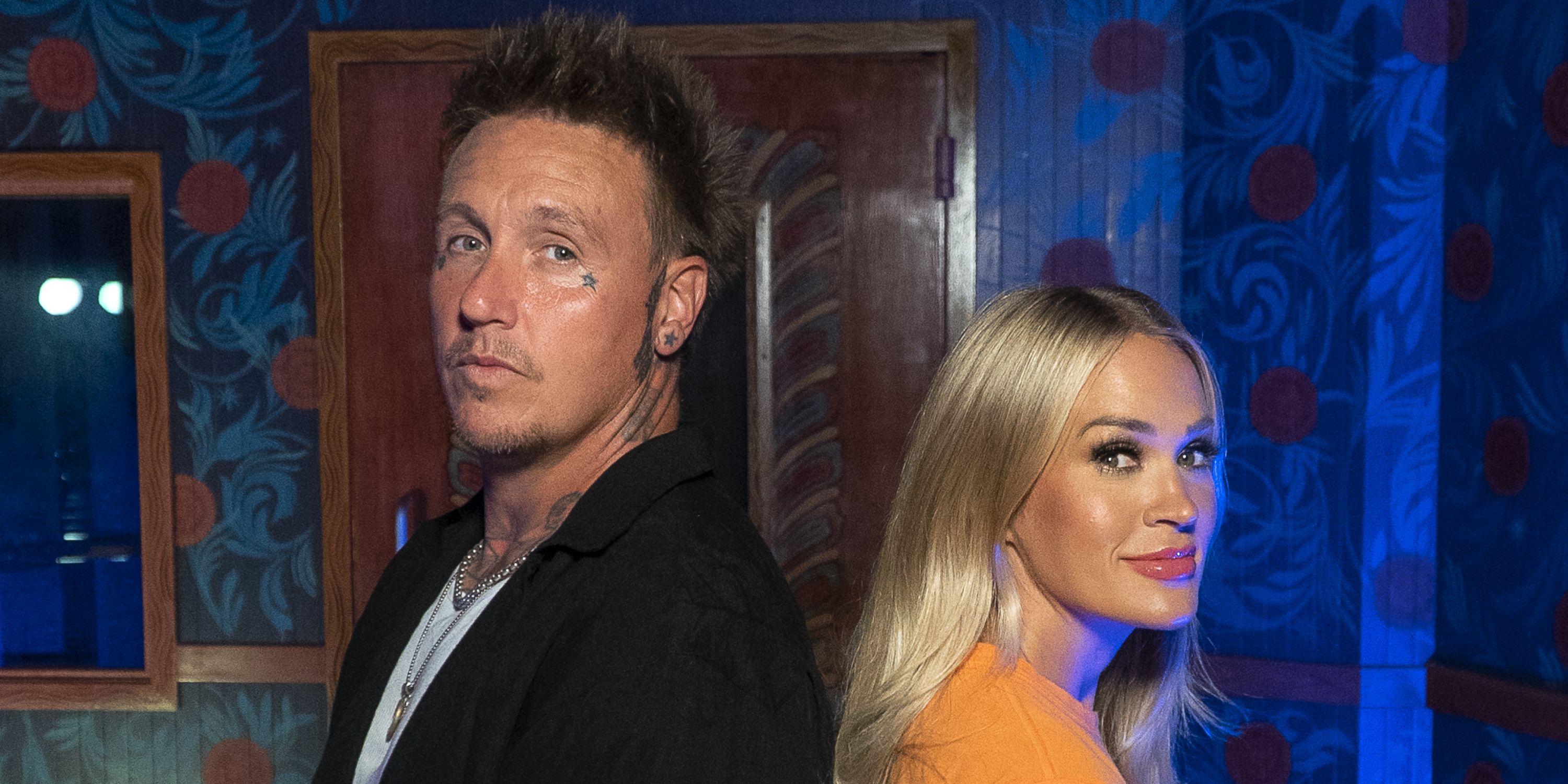 Papa Roach frontman Jacoby Shaddix with Carrie Underwood when they recorded the duet "Leave a Light On" 