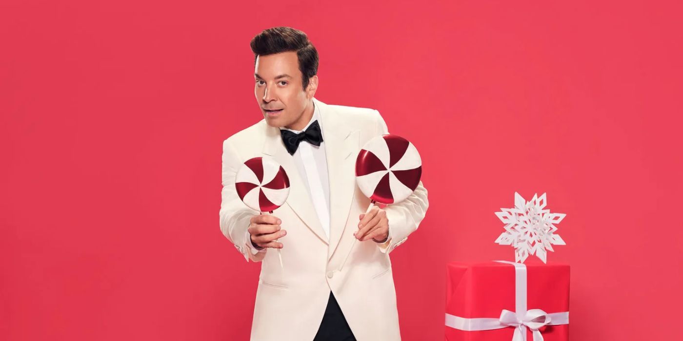 Jimmy Fallon holding two seasonal lollipops in promo for 'Jimmy Fallon Holiday Seasoning Spectacular'.
