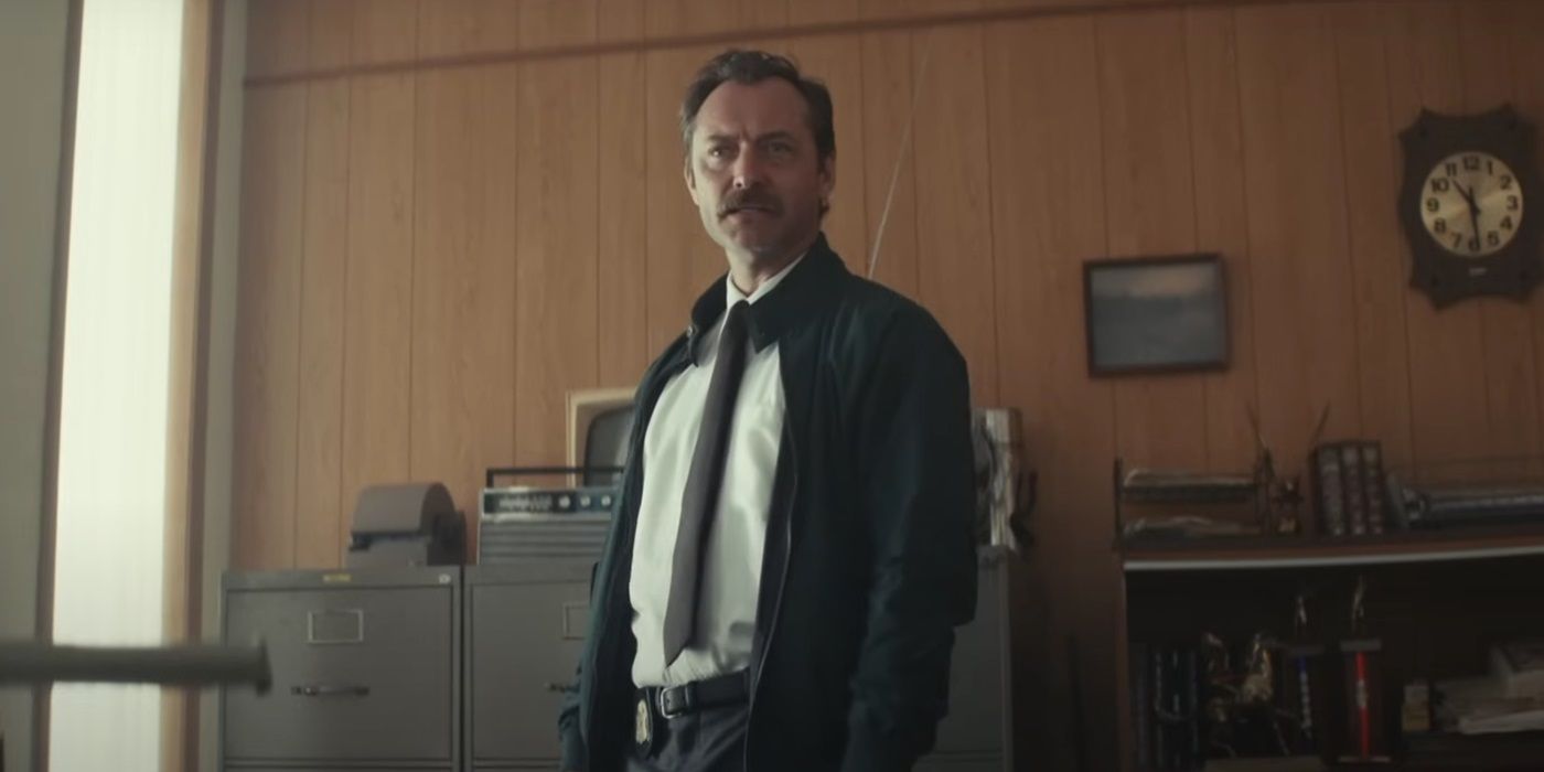 Jude Law, standing in his uniform, as Terry Husk in The Order