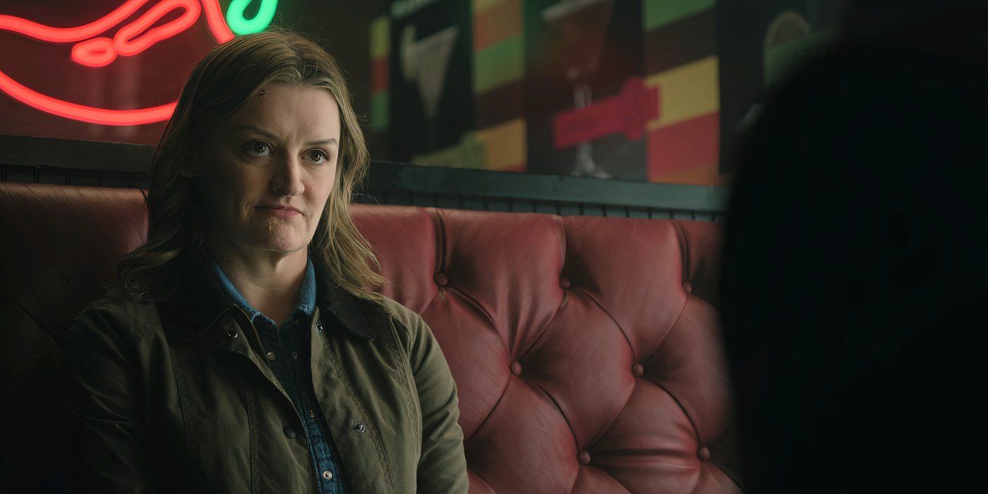 Alison Wright as Julia Jayne sits in a booth at Chili's in The Madness.