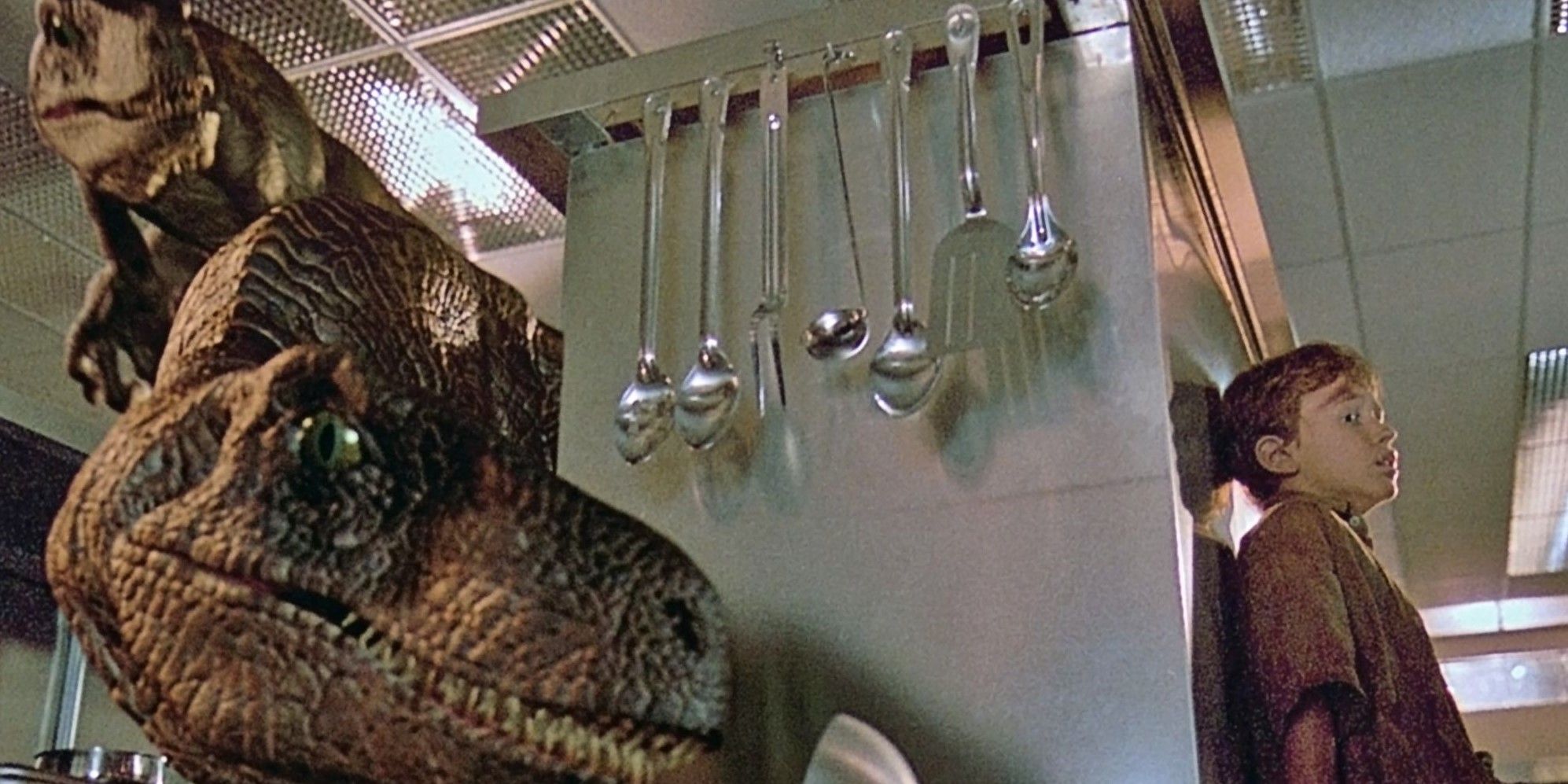 The velociraptors stalking young Tim in a kitchen in Jurassic Park.